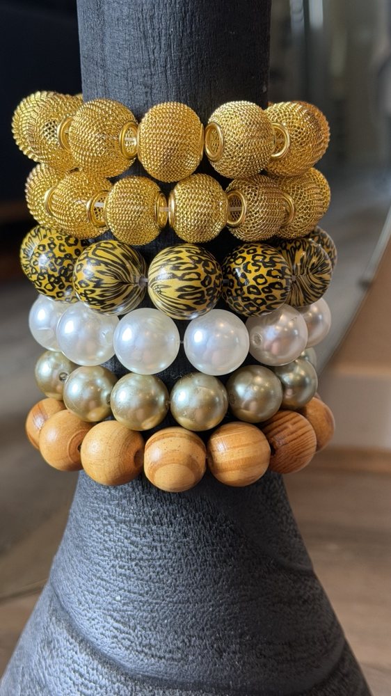 Five-bracelet PewedUp stack: gold filigree, leopard, pearl, champagne pearl and natural wood beads